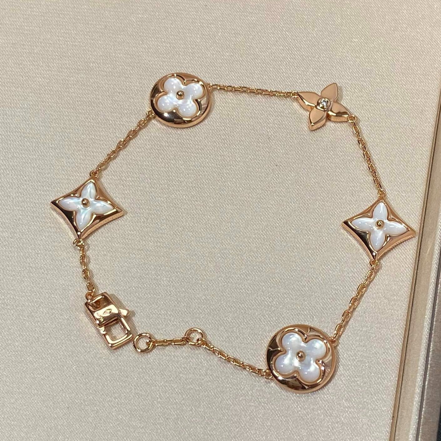 [Liorra]STAR AND SUN 5 MOTIF MOP PINK GOLD BRACELET