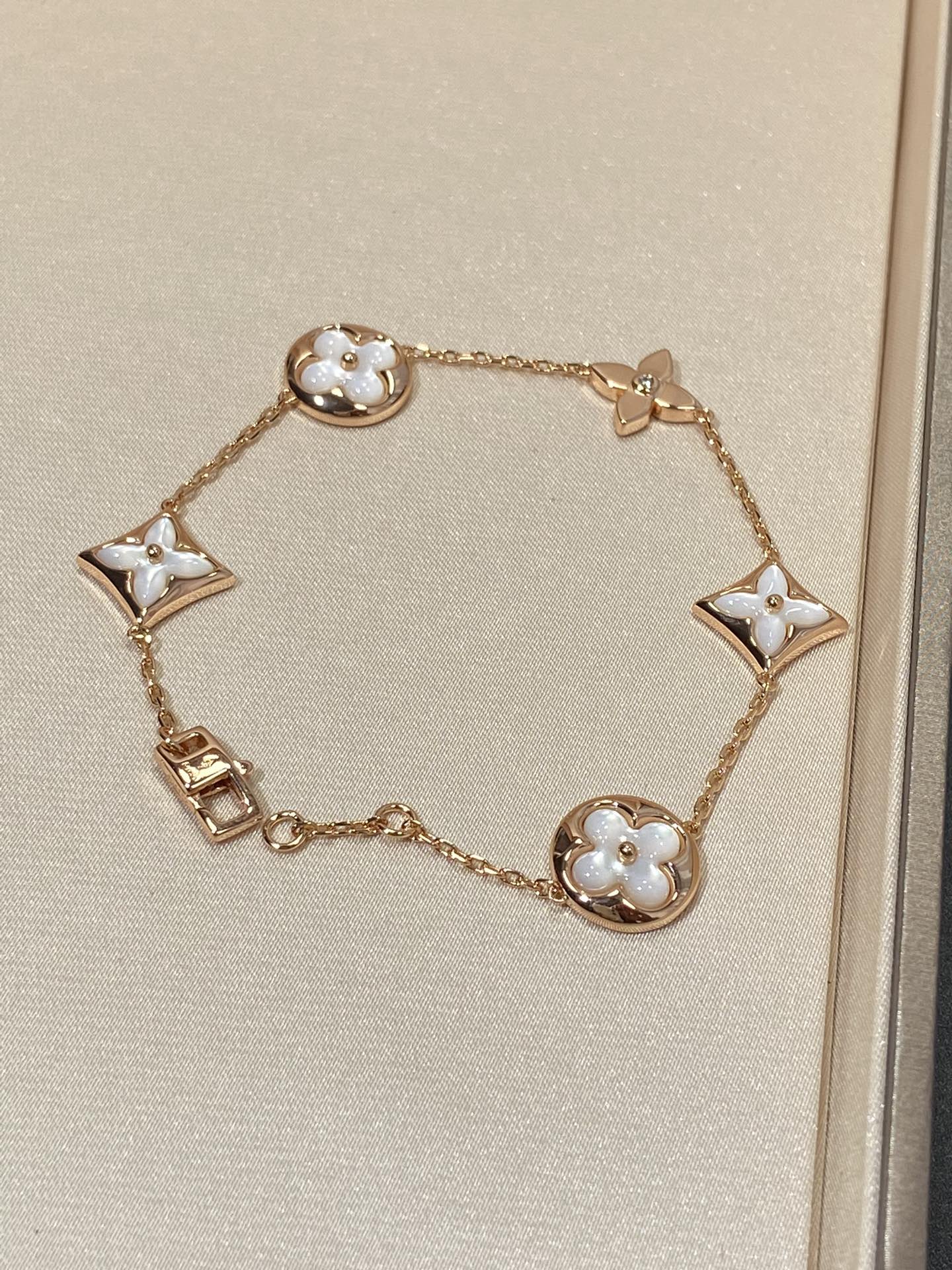 [Liorra]STAR AND SUN 5 MOTIF MOP PINK GOLD BRACELET