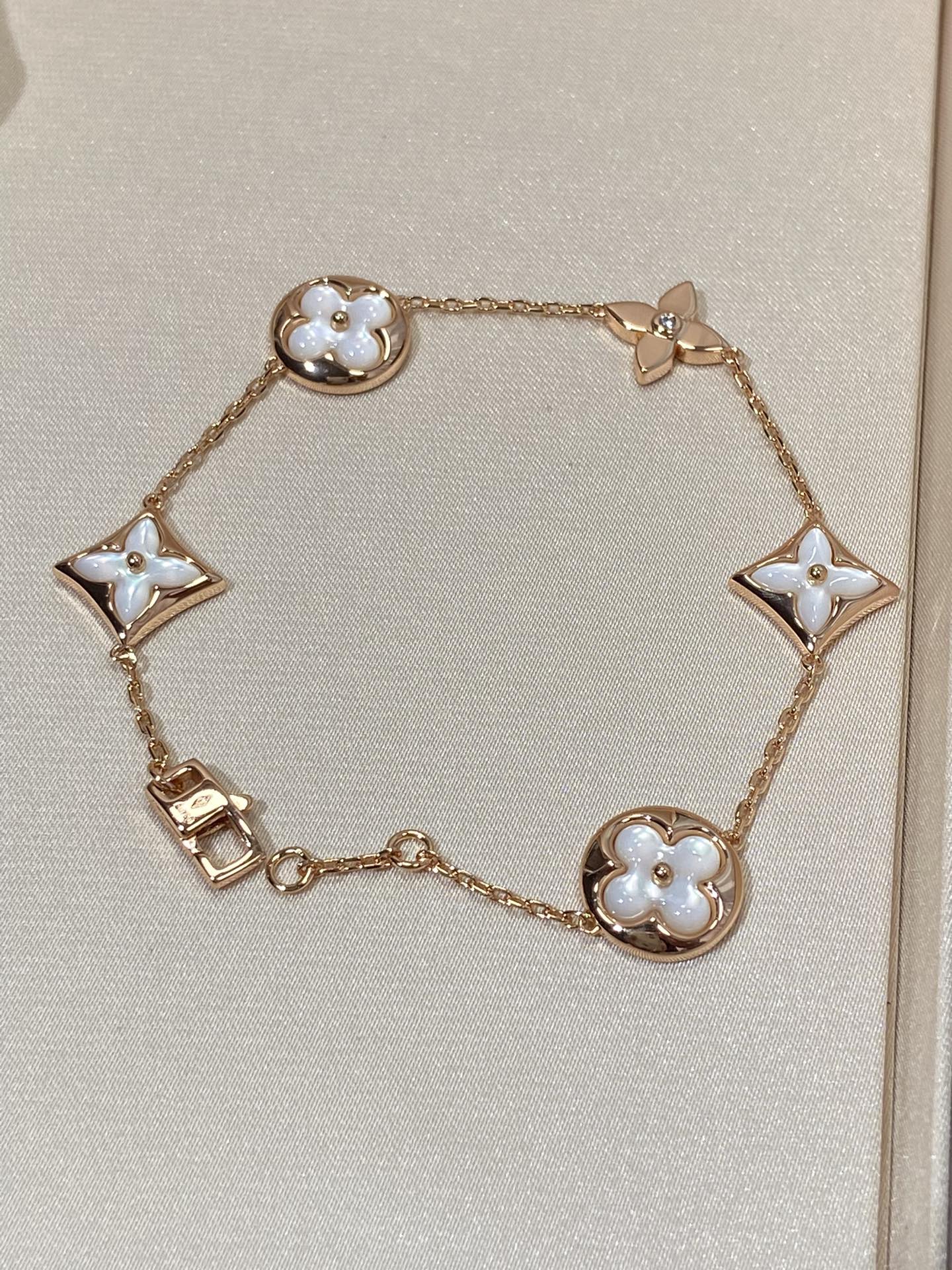 [Liorra]STAR AND SUN 5 MOTIF MOP PINK GOLD BRACELET