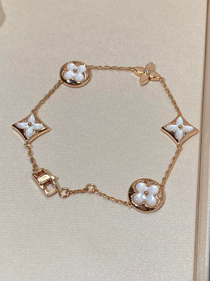 [Liorra]STAR AND SUN 5 MOTIF MOP PINK GOLD BRACELET