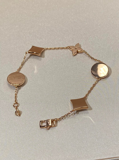 [Liorra]STAR AND SUN 5 MOTIF MOP PINK GOLD BRACELET