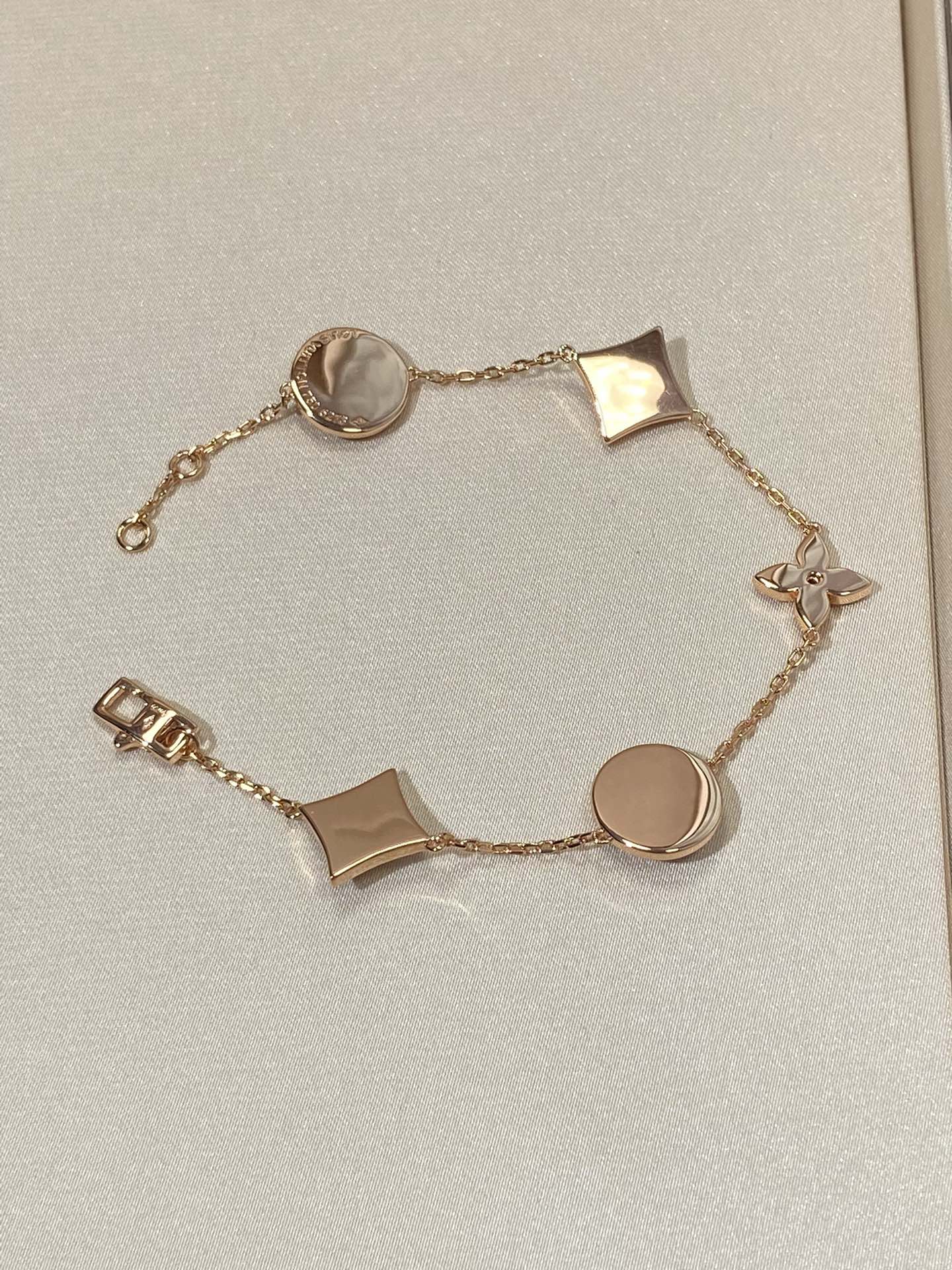 [Liorra]STAR AND SUN 5 MOTIF MOP PINK GOLD BRACELET