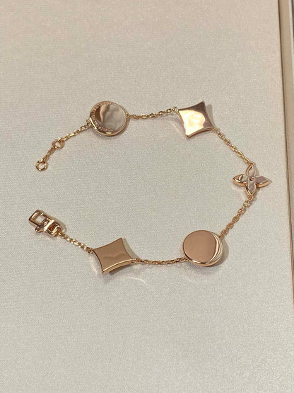 [Liorra]STAR AND SUN 5 MOTIF MOP PINK GOLD BRACELET