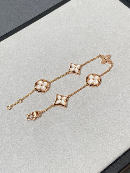 [Liorra]STAR AND SUN 5 MOTIF MOP PINK GOLD BRACELET