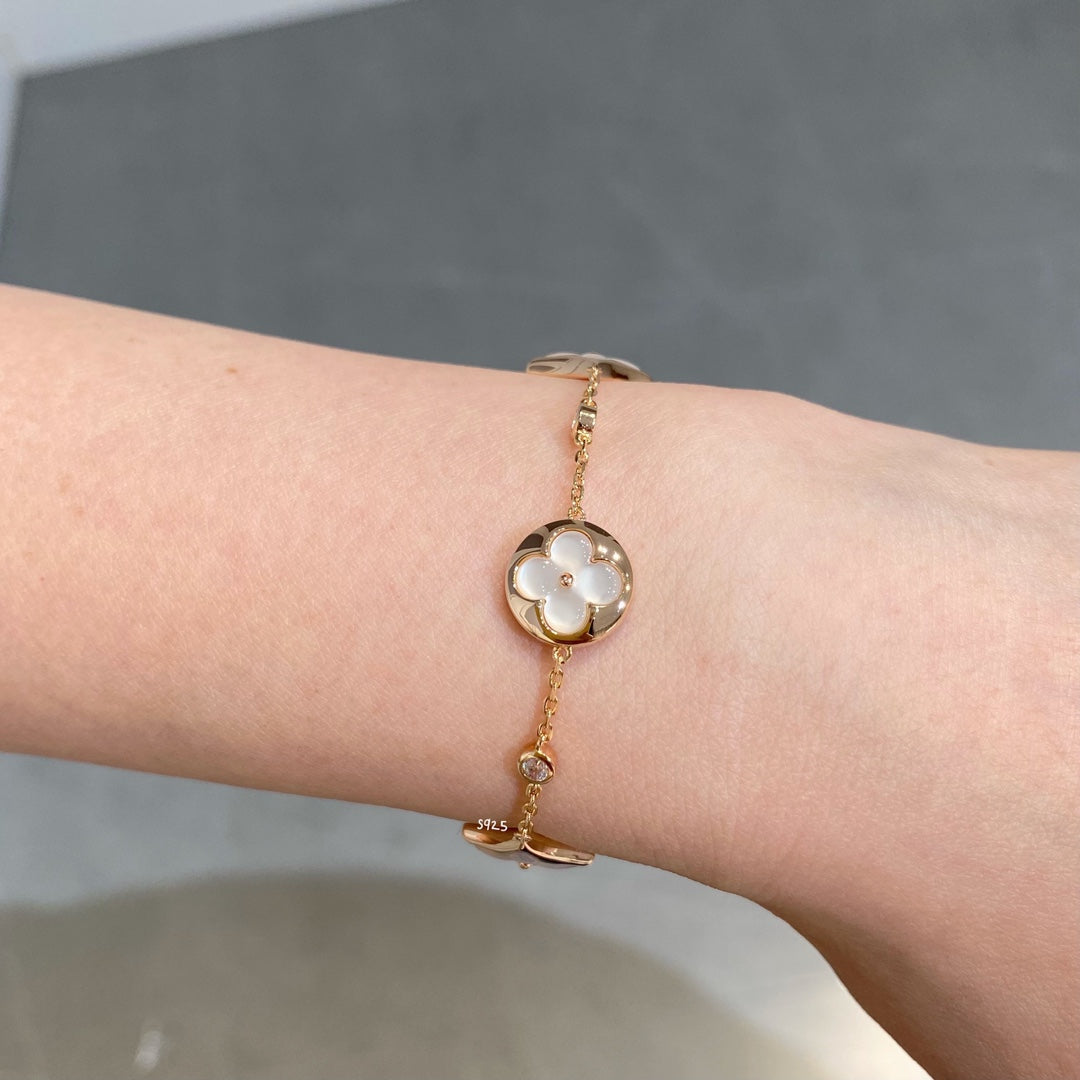 [Liorra]STAR AND SUN 4 MOTIF WHITE MOP PINK GOLD BRACELET